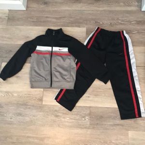 Black, white, gray and red Nike outfit size 5